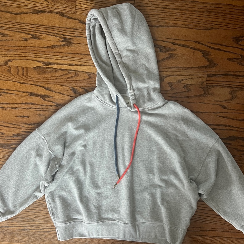 THE GREAT. Light Gray Hoodie with Red and Blue Drawstrings